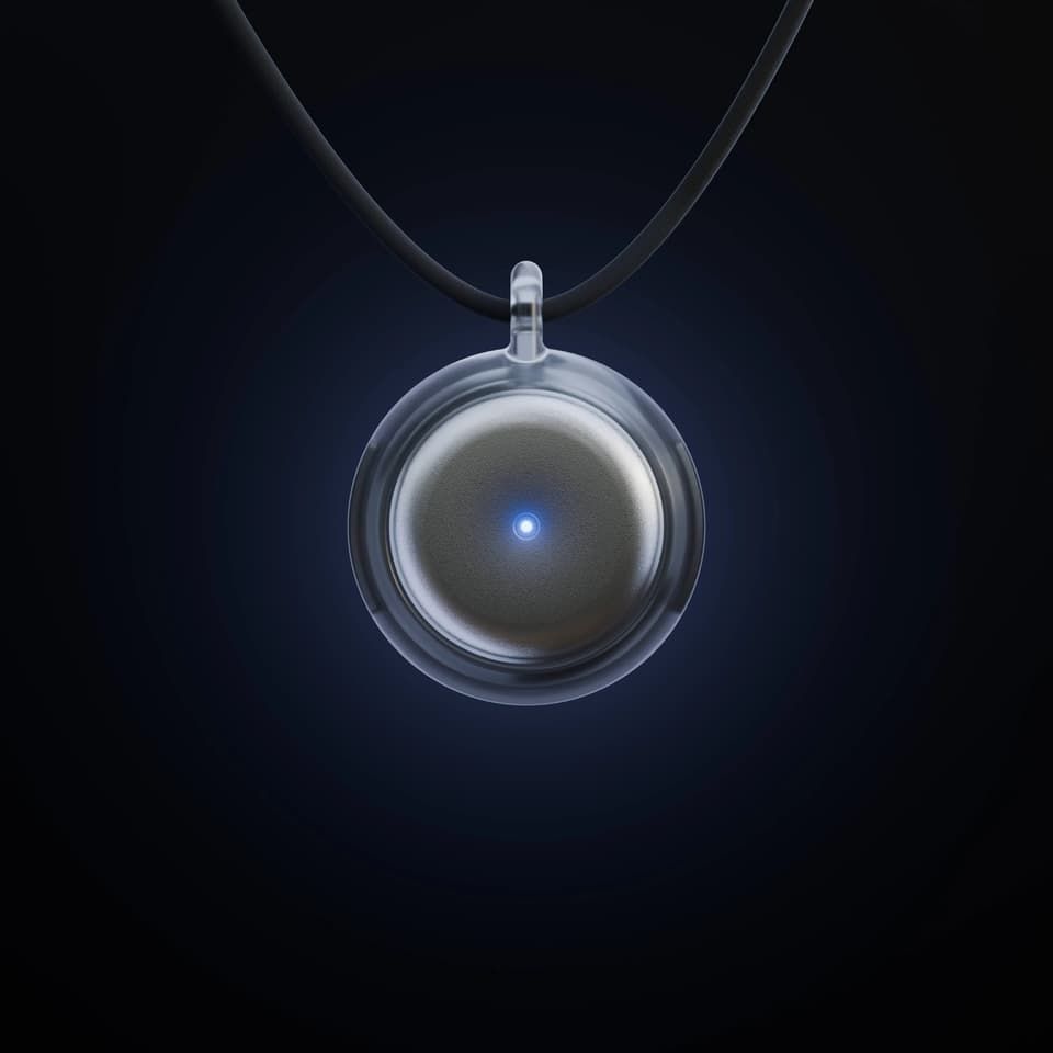 Necklace with a glowing pendant on a dark background